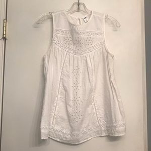 White sleeveless eyelet top